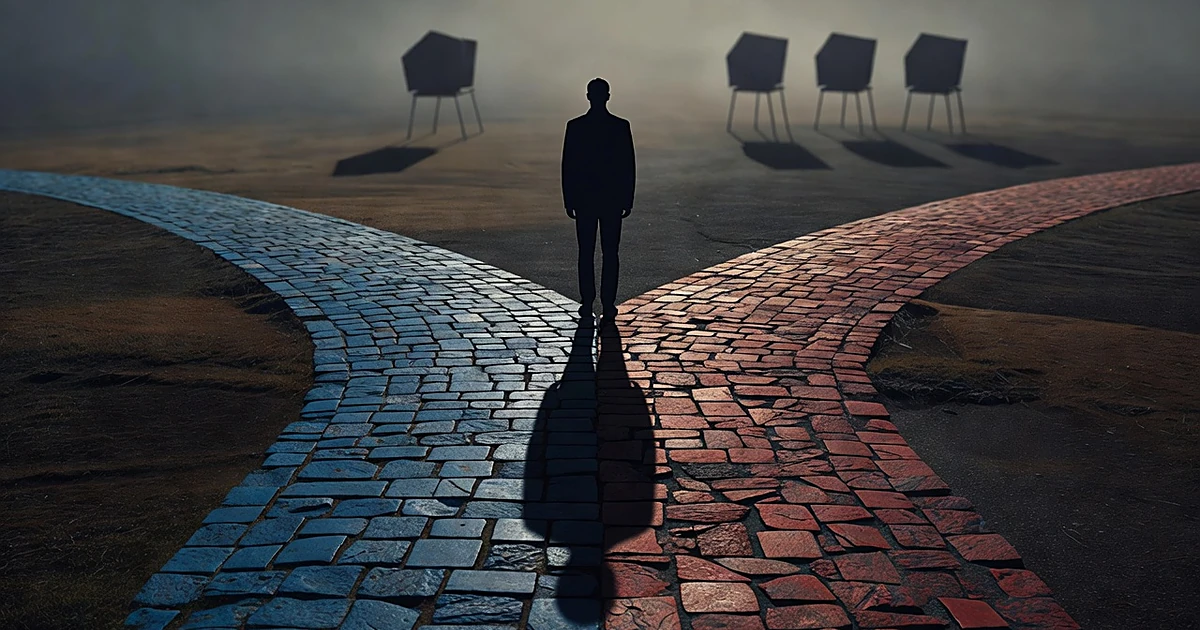 Silhouetted person at crossroads between blue and red paths with voting booths in background